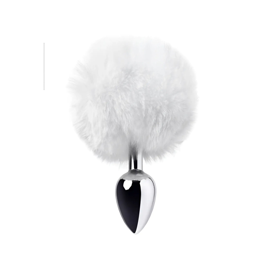 A sleek silver metal anal plug with a chrome finish and a fluffy white pom-pom tail
