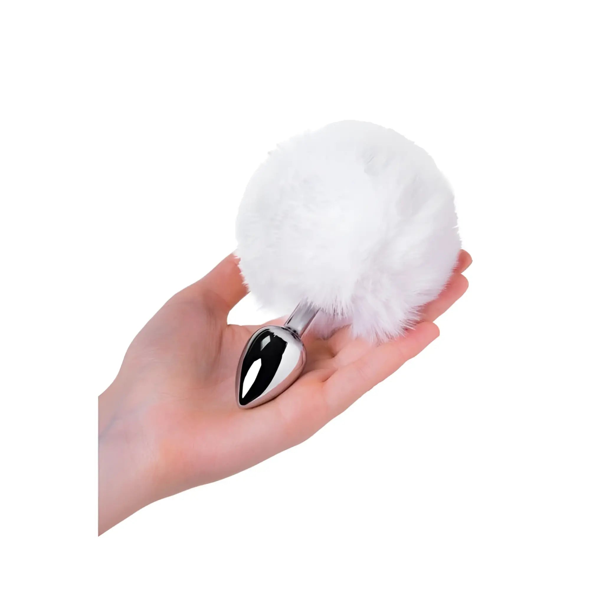 A sleek silver metal anal plug with a small white faux fur pom-pom tail attached to its base