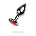 Shiny chrome-plated metal anal plug with a faceted red ruby heart gemstone set in the base small size