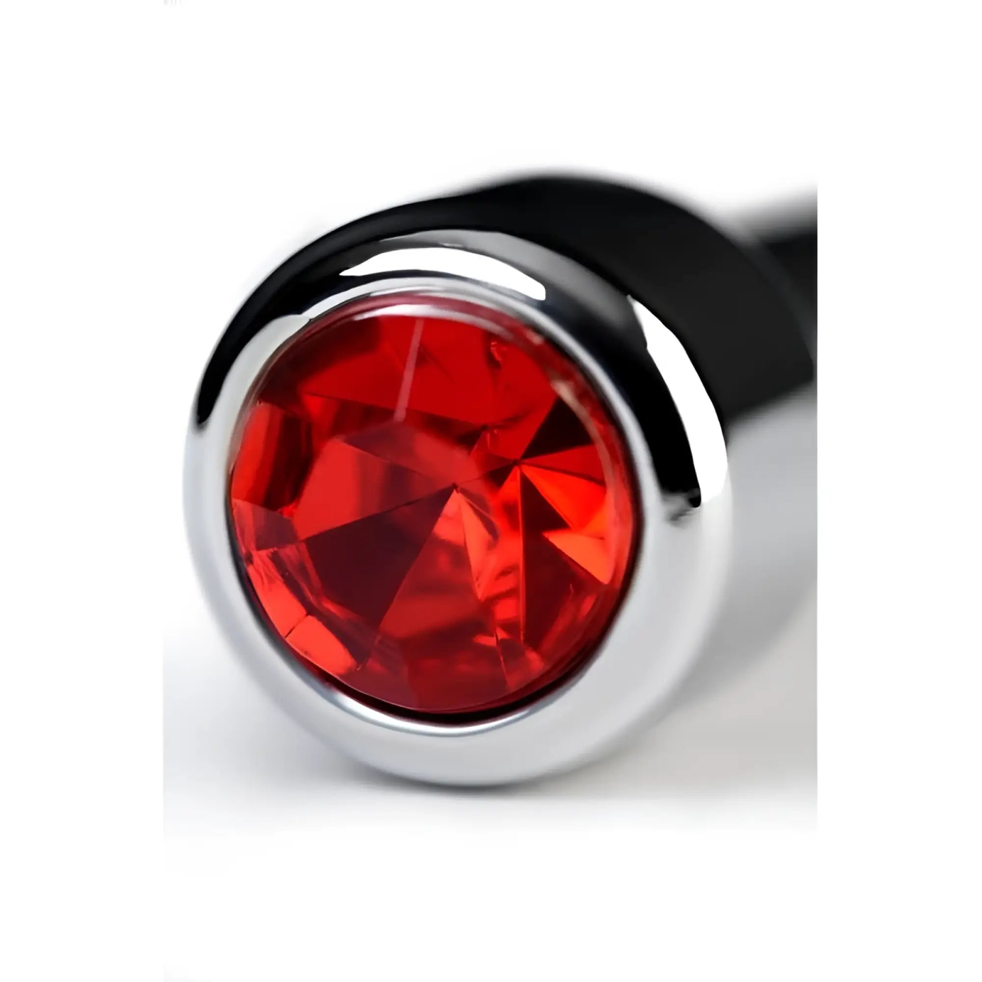 A sleek chrome-plated metal silver urethral plug with a vibrant faceted ruby rhinestone head