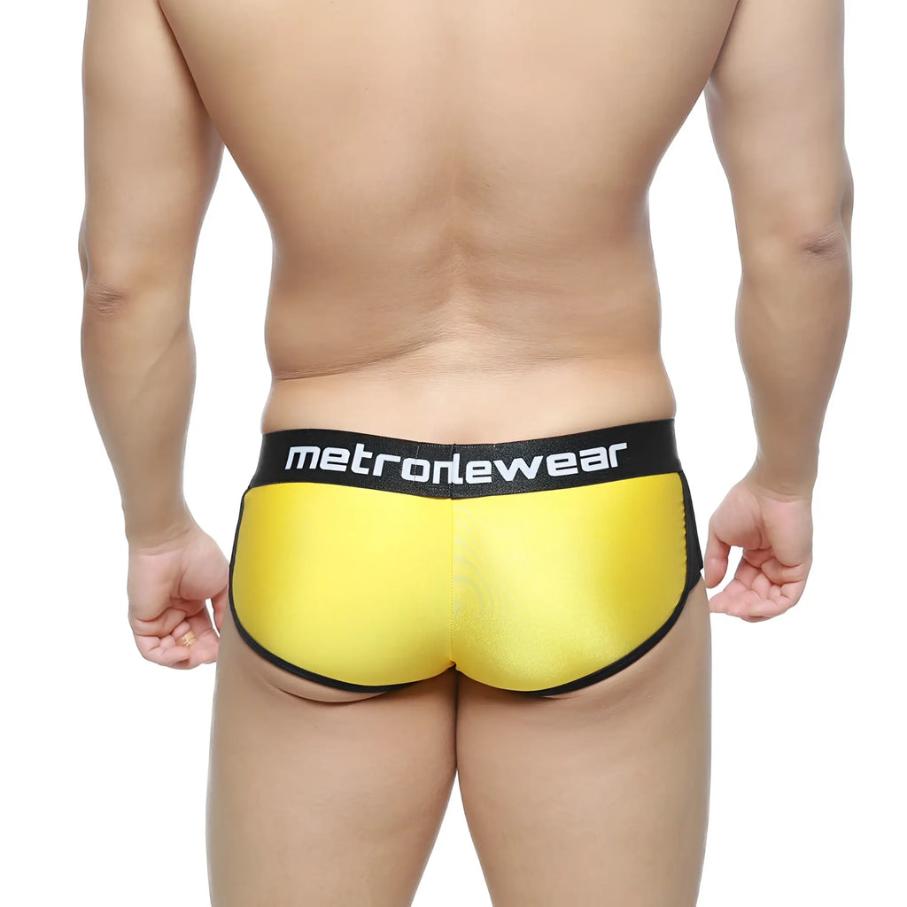 Bright yellow metallic MetroMaleWear active boxer briefs with black elastic waistband featuring metronewear branding
