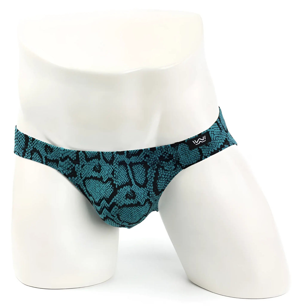 Teal and black snake-scale patterned men’s briefs on mannequin metroMalewear Amazonic bikini 5103-96 design