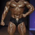 Black snakeskin-patterned swim briefs with gold toned circular belt buckle by MetroMaleWear Anaconda 4936-30