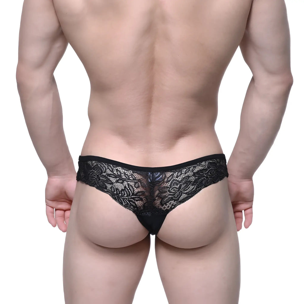 MetroMalewear aragon thong black 1152-20 is a black lace thong with intricate floral patterns and a sheer delicate design