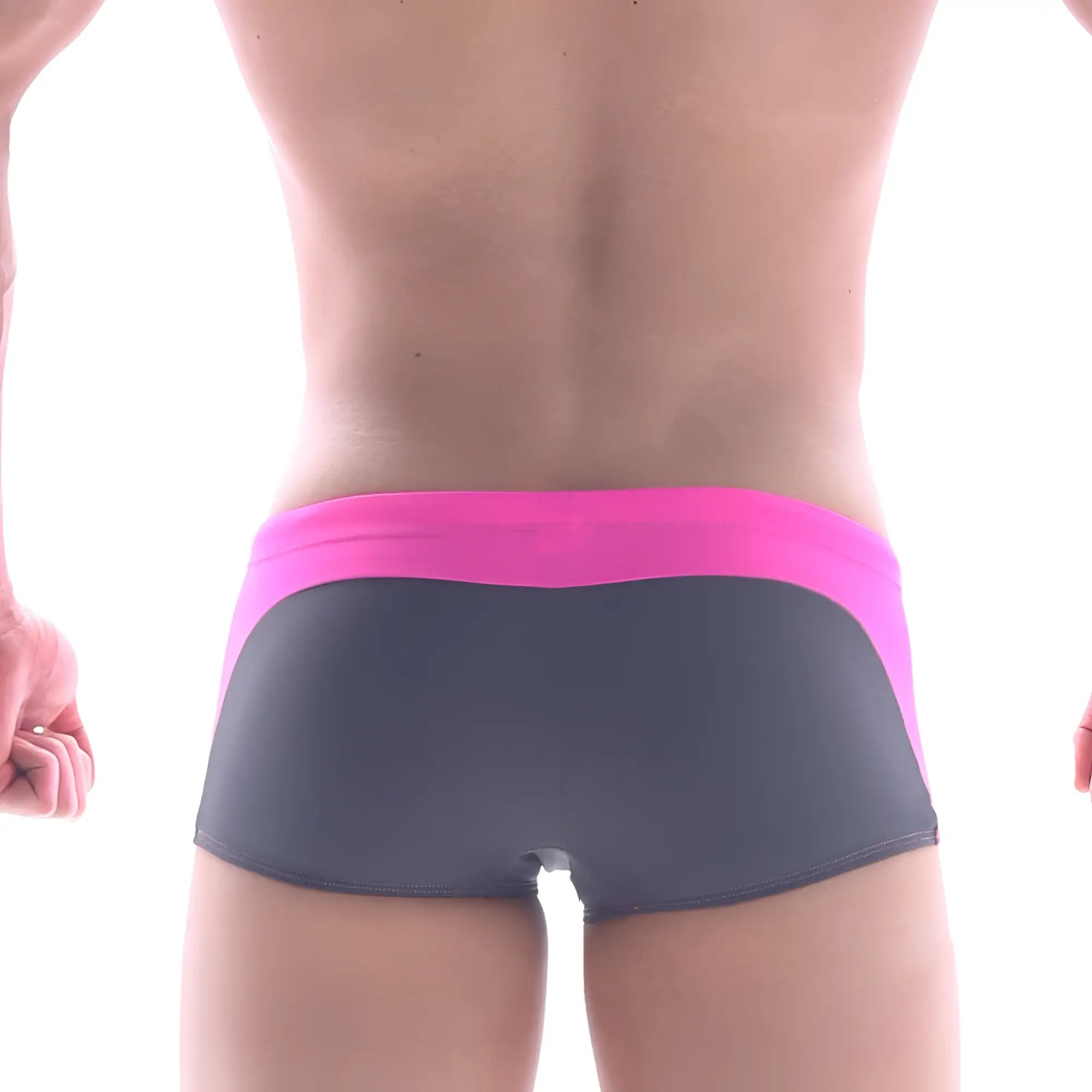 The back of metro malewear arc swim boxer pink briefs with vibrant pink waistband and dark gray body
