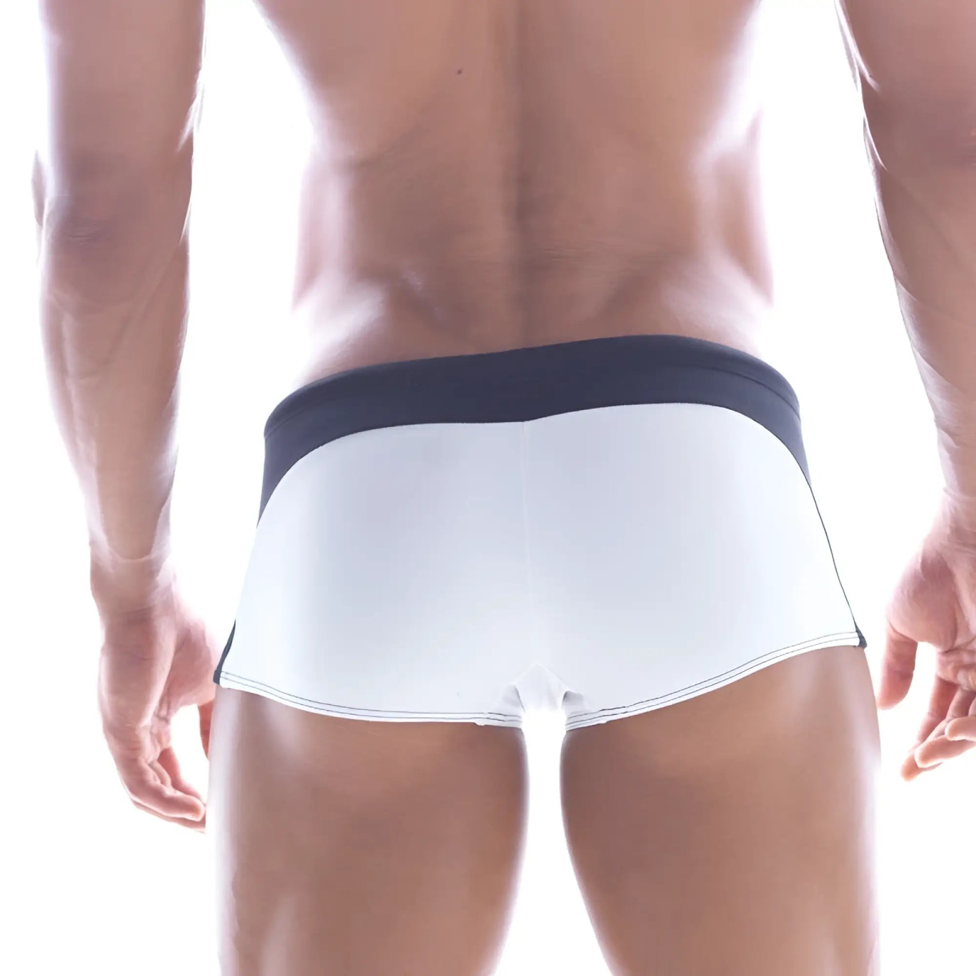 White swim trunks with navy blue waistband and trim from Metromalewear Arc swim boxer 4925-00 for men