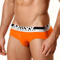 Bright orange MetroMaleWear Asian brief with white and black elastic waistband featuring MetroMaleWear logo
