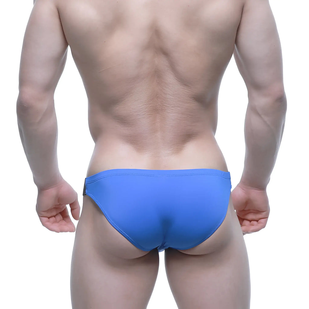 Bright blue metroMalewear BEATNIK Bikini royal swim trunks with sleek form-fitting design for active wear