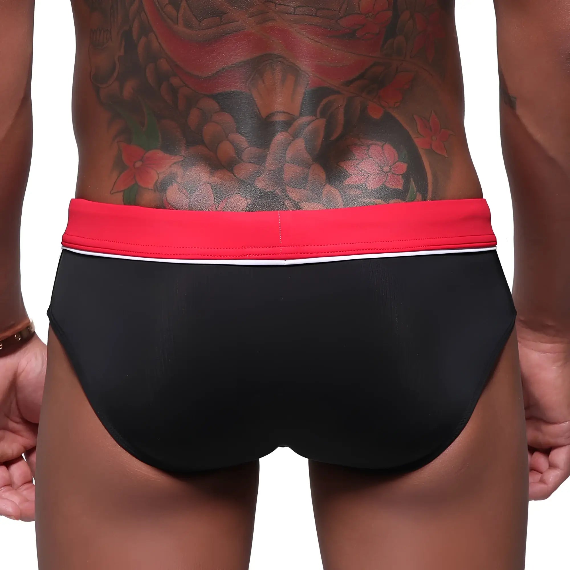 MetroMaleWear Bing Sport black swim briefs with vibrant red waistband and thin white trim for active wear