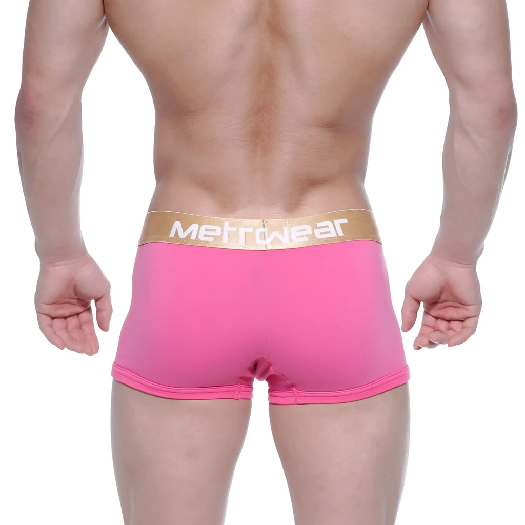 Metro male wear body boxer brief pink 1023-02 features pink mettwear fabric with a gold waistband and white lettering