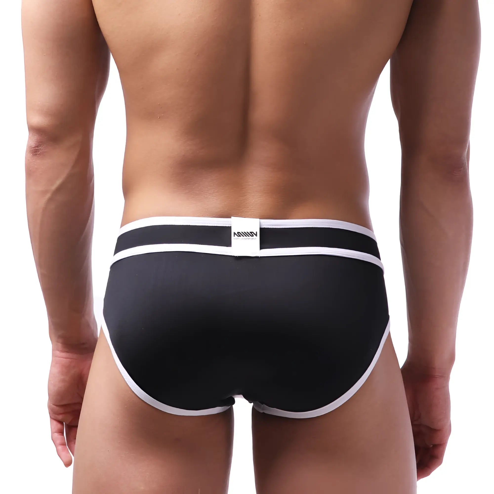 Black MetroMaleWear bold swim brief with white trim and branded waistband label designed for stylish swimwear use