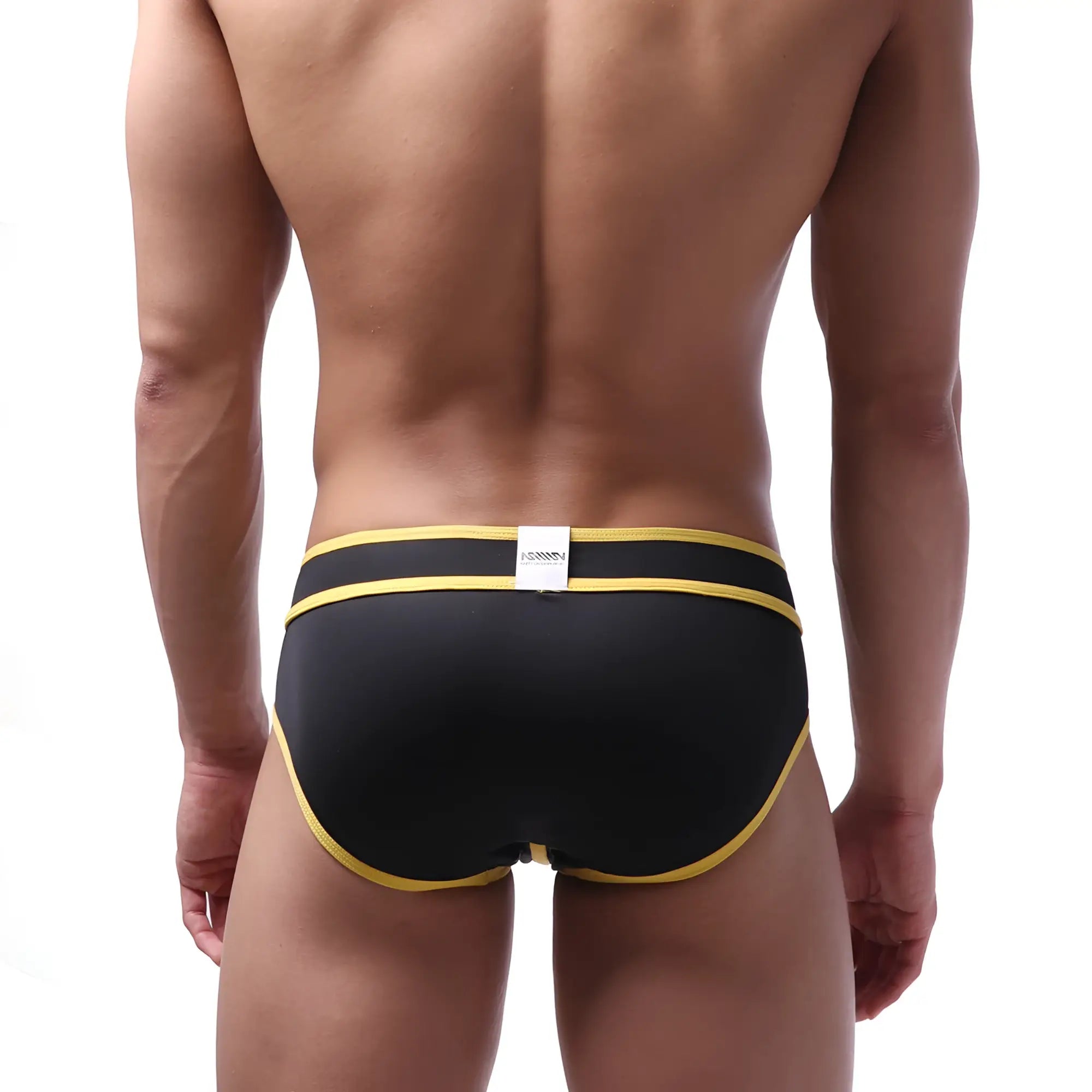 Metro male wear bold swim brief black with yellow trim and white brand tag at waistband for swimming and beachwear