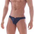 Navy blue cotton bosillo half back bikini briefs with a small red and white MetroMaleWear brand tag at the waistband