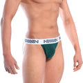 Dark green athletic briefs by metromalewear with white elastic waistband and gray repeating logo for active wear