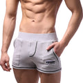 Grey heathered MetroMaleWear Boston athletic shorts with black contrast stitching and branded front pocket patch