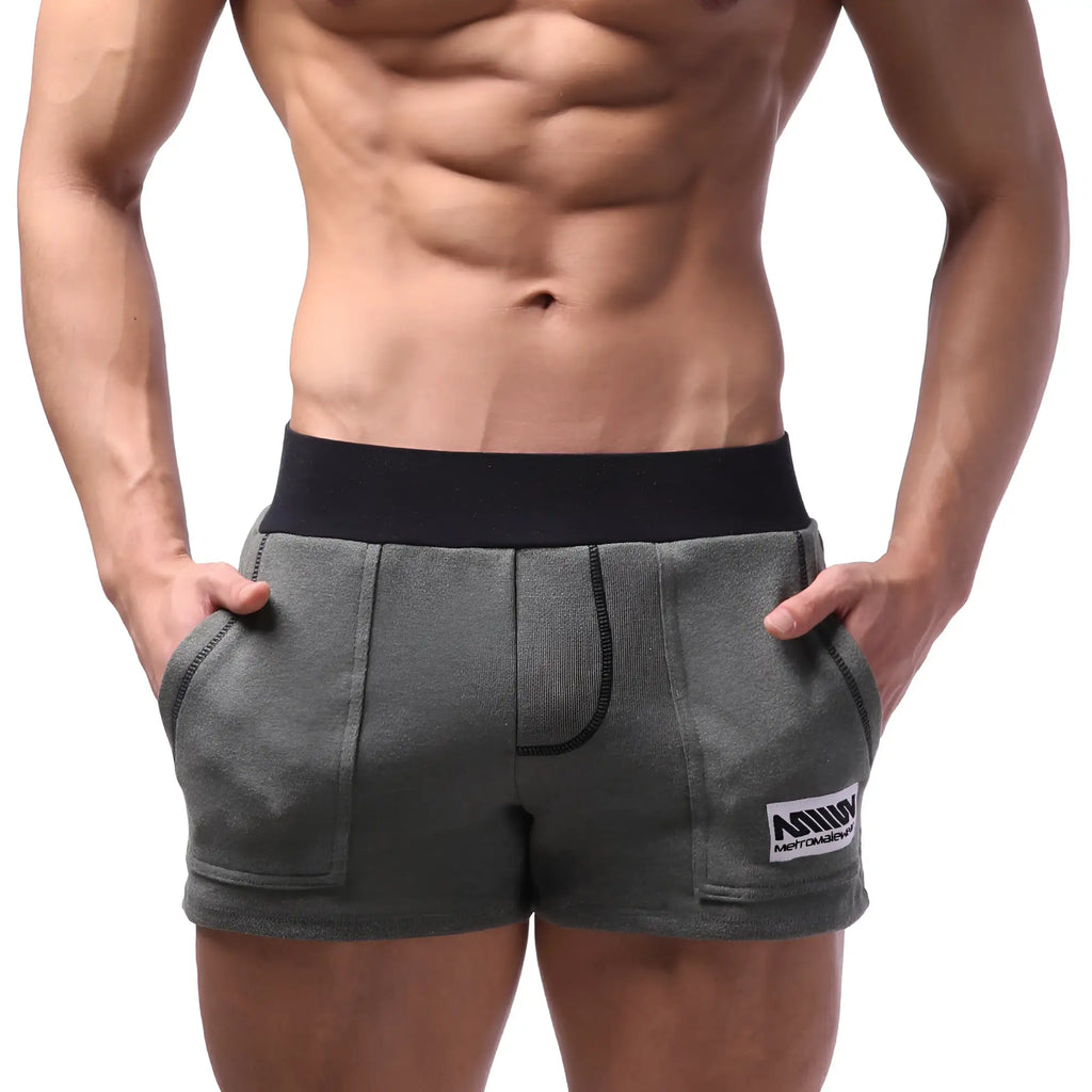 Gray MetroMaleWear Boston athletic shorts with black elastic waistband and white logo patch on lower right leg
