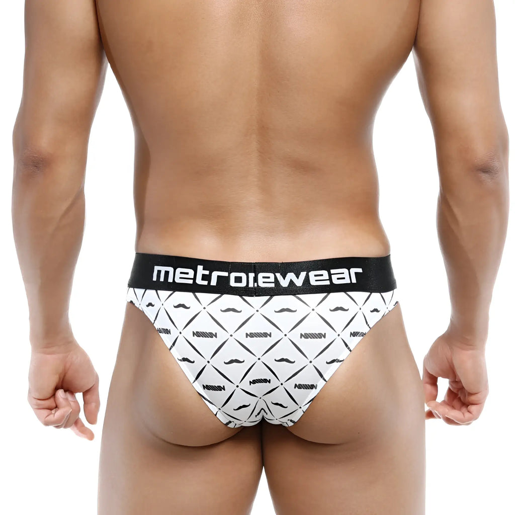 White briefs with black geometric mustache pattern and metroewear logo on waistband showing back side view
