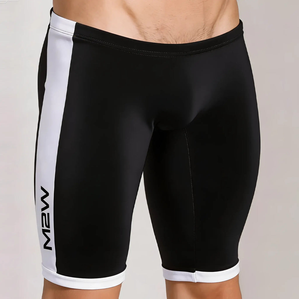 Black and white MetroMaleWear Campus Jammer athletic shorts with vertical white stripes and m2w branding on the left leg