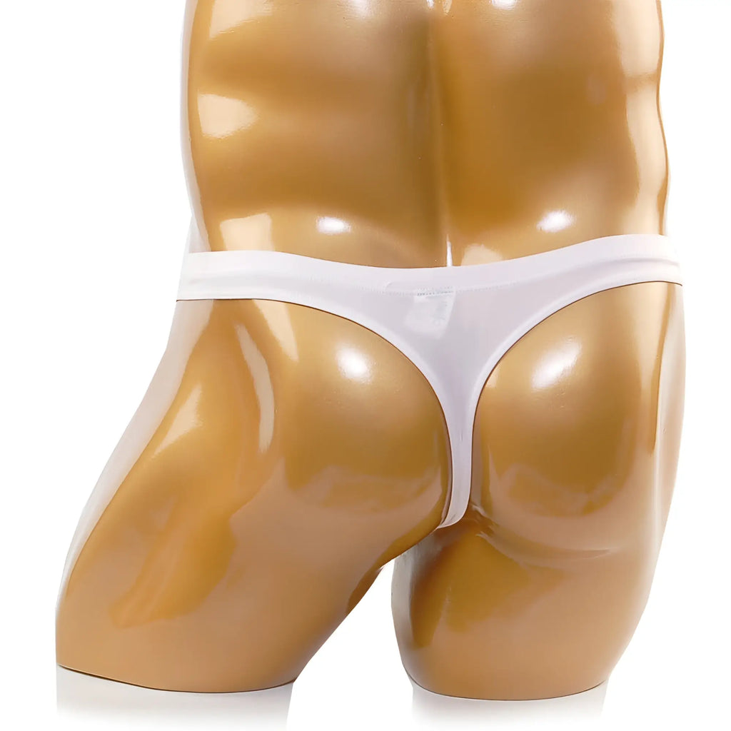 White thong by metromalewear cannon in nude displayed on glossy mannequin torso showcasing sleek design