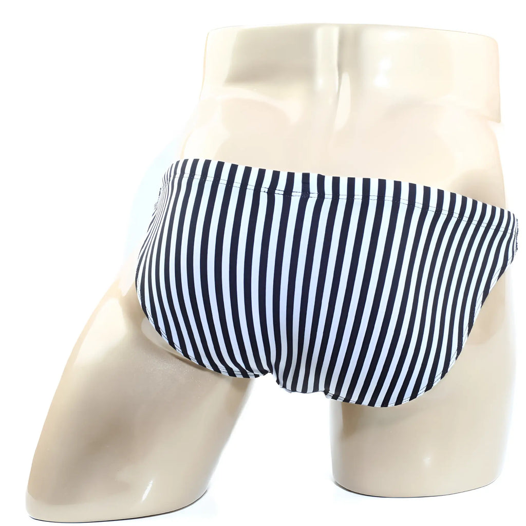 MetroMaleWear carousel swim bikini 4937-55 black and white vertically striped men’s swim trunks on mannequin
