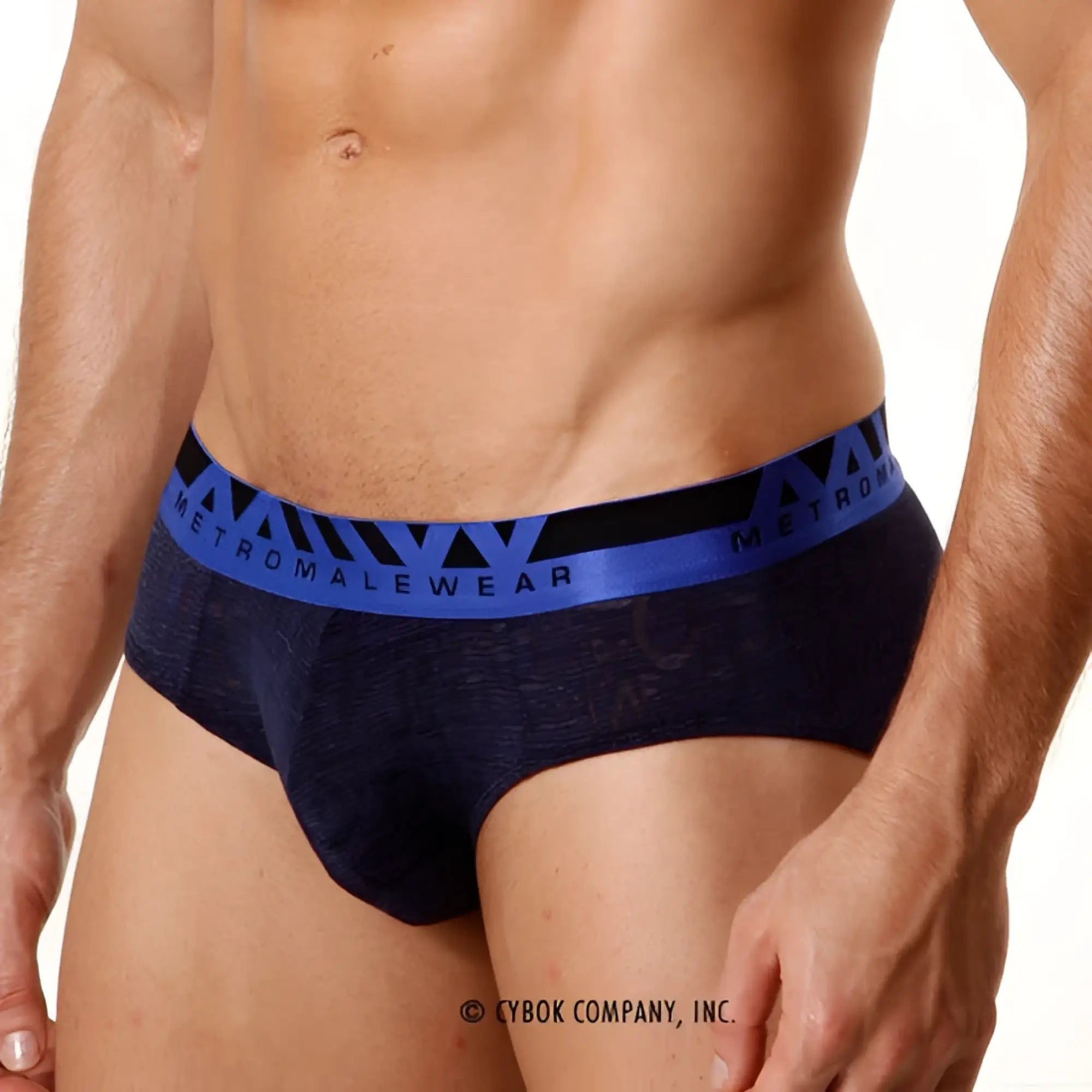 Navy blue textured MetroMaleWear carve hip brief with bold blue and black elastic waistband featuring logo
