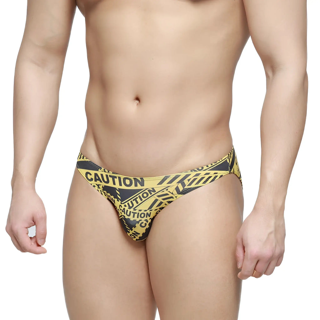 MetroMaleWear caution lowrise bikini briefs in yellow and black caution tape pattern for bold men’s underwear style