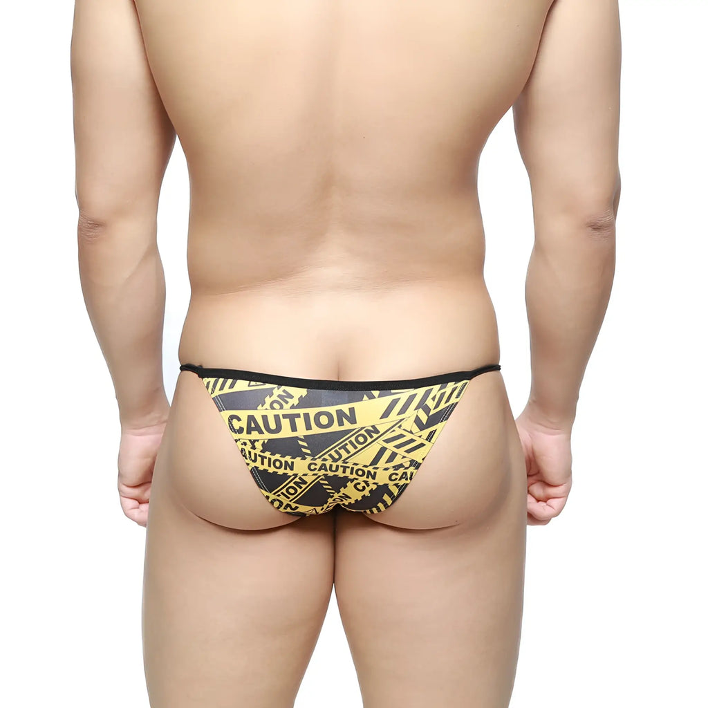 Metro malewear caution string bikini men’s briefs with black and yellow caution tape pattern for bold style