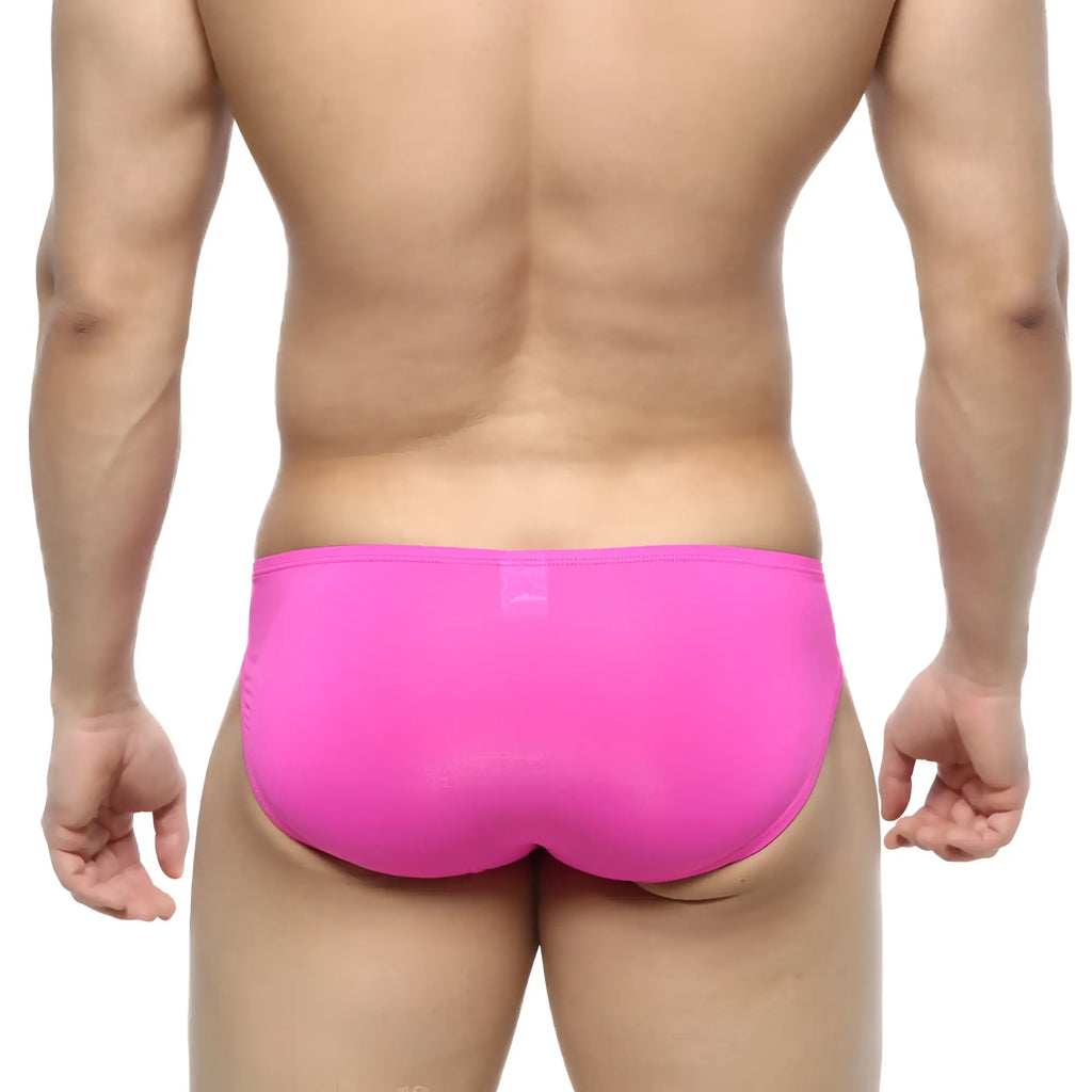Bright pink form-fitting swim trunks with smooth stretchy fabric from MetroMaleWear Cesar Bikini Magenta 6009-02