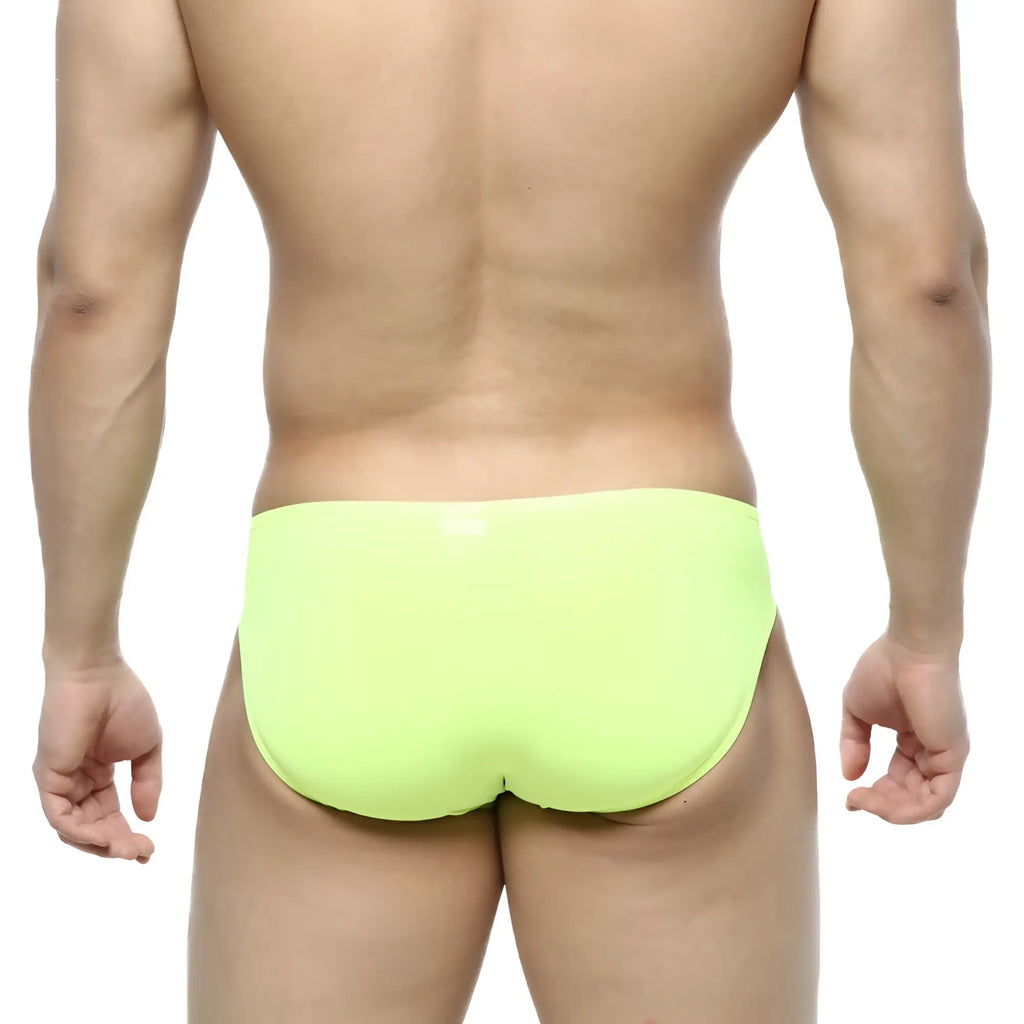 Bright lime green metroMalewear cesar bikini briefs with smooth form-fitting design and neon green color