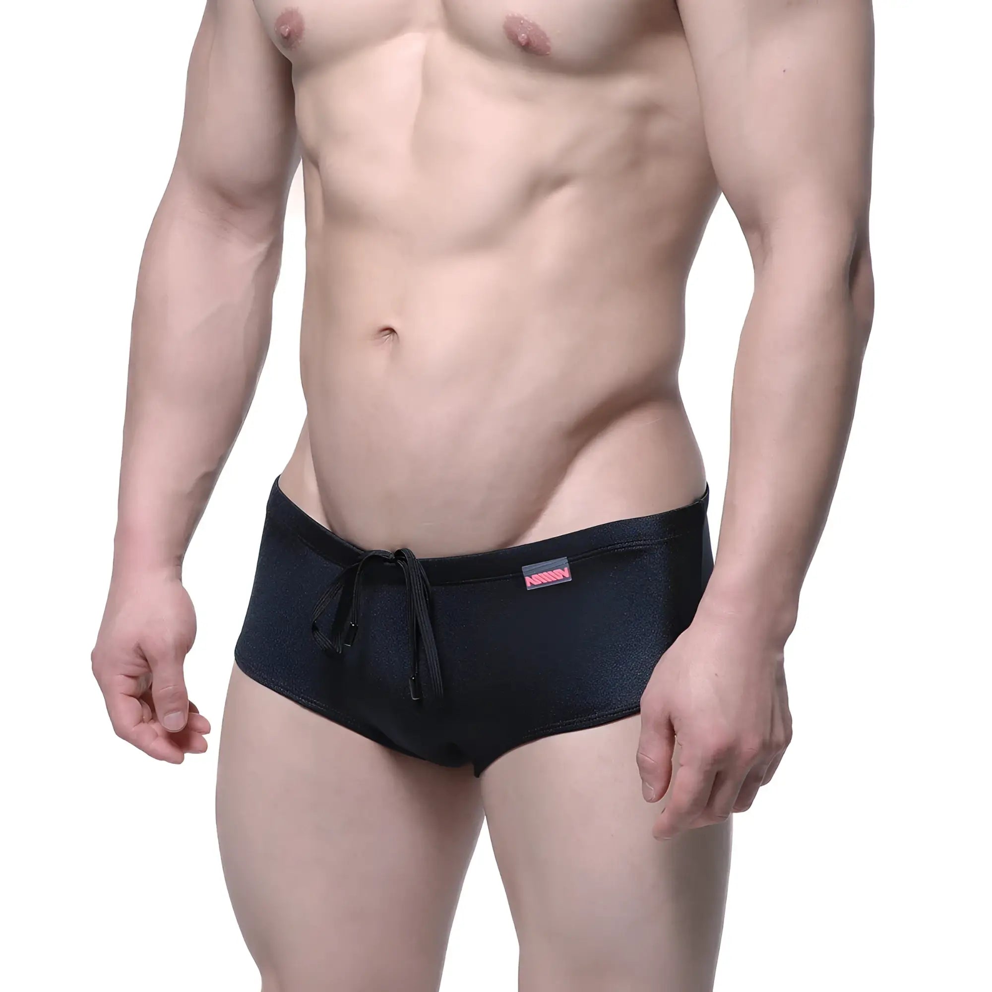 Black MetroMaleWear Charile swim brief with drawstring waistband and small pink logo on the side in onyx color