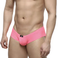 Bright pink form-fitting mens briefs by MetroMaleWear with smooth fabric and a black logo on the waistband