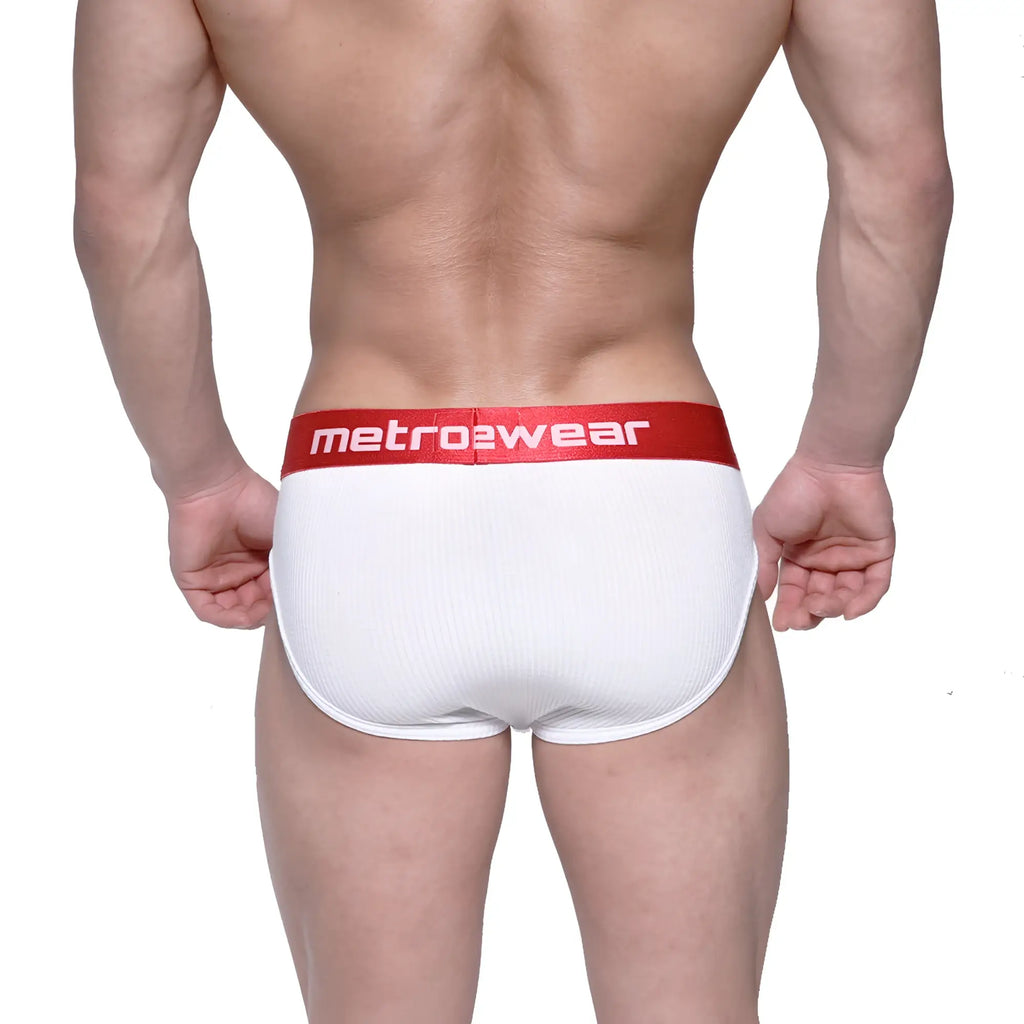 White ribbed briefs with a red waistband featuring the metro2wear logo from metro malewear classic ribbed brief series