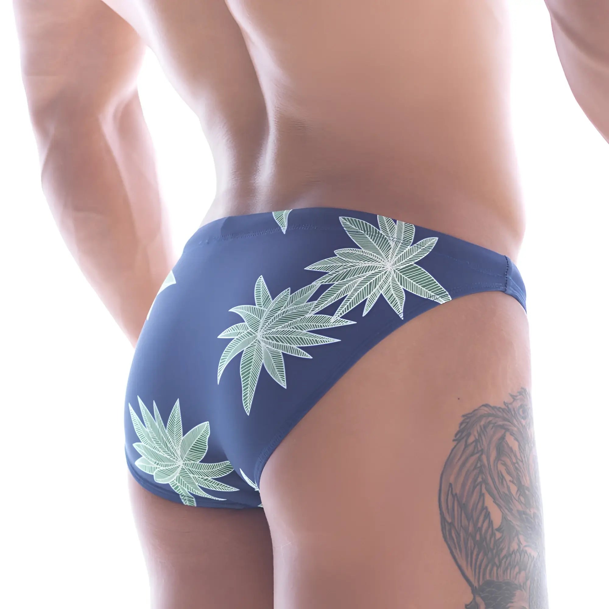 Navy blue MetroMaleWear Classic Swim Bikini beach trunks with light green cannabis leaf pattern for men