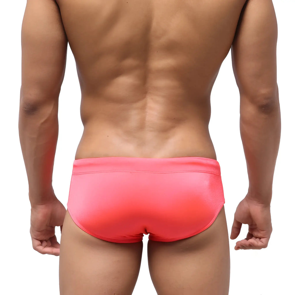 Bright pink metro male wear classic swim brief with smooth form fitting design for swimwear use