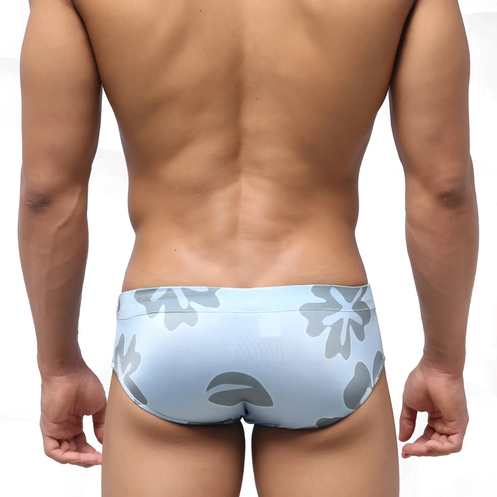 Light blue metroMalewear classic swim brief with gray floral pattern suitable for swimming and beachwear