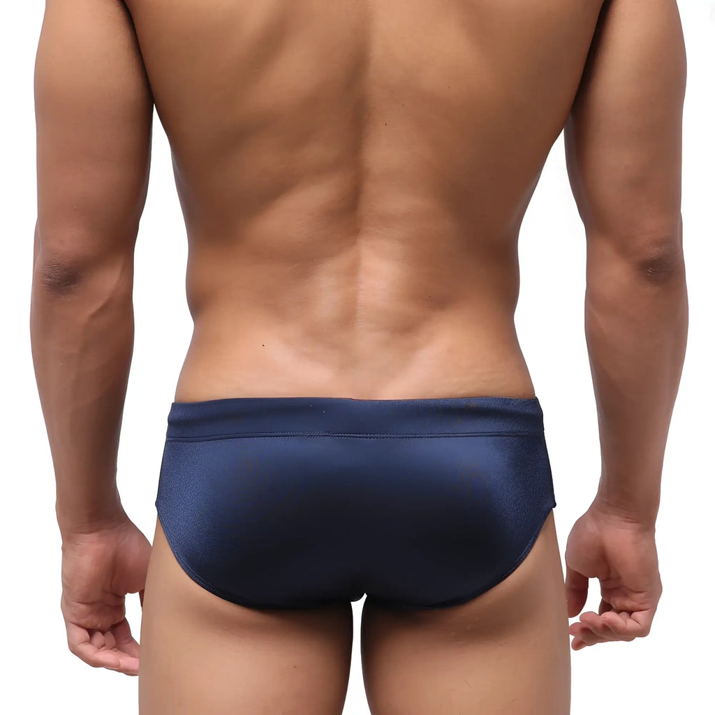 Navy blue metro malewear classic swim brief in smooth textured fabric with a snug fit for swimming and beachwear