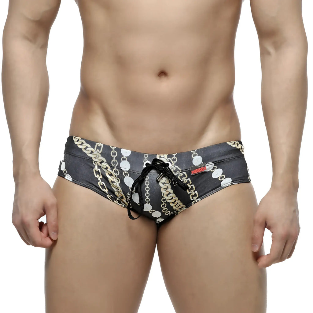 MetroMaleWear classic swim brief Rico 4914-95 black with bold gold and white chain-link pattern and matching drawstring