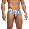 White swim trunks with black snake-scale pattern from metro male wear classic swim brief 4964-60 collection