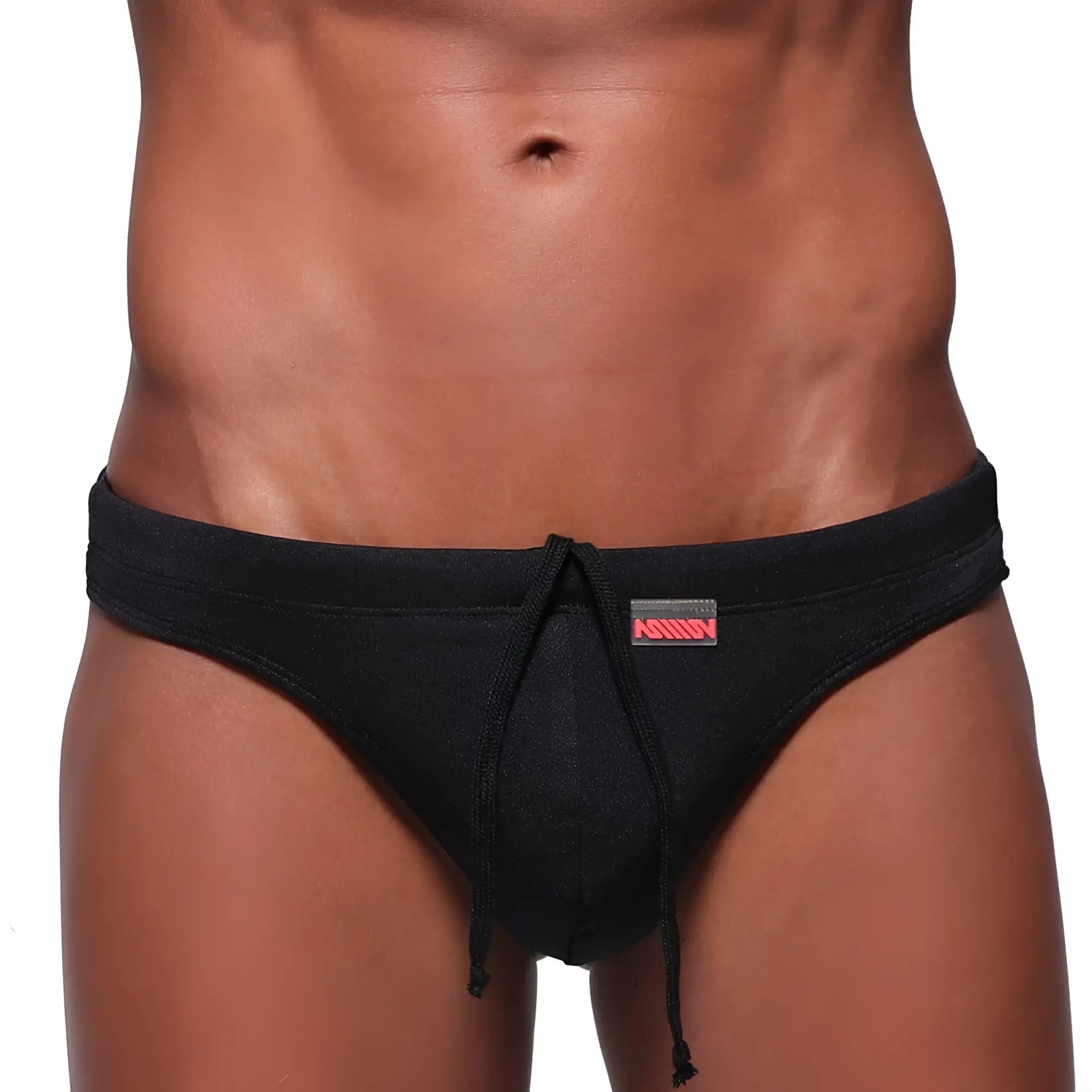 MetroMaleWear classic swim thong black with subtle textured fabric and red logo on waistband for swimwear use