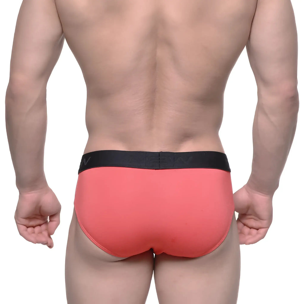 Coral-colored cotton briefs with black elastic waistband from metromalewear suitable for hip support and comfort