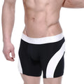 Black and white cotton athletic briefs with bold diagonal stripes and a sleek form-fitting design metroMalewear arc