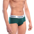 Dark green cotton pouch boxer briefs for men with a white elastic waistband featuring a gray logo pattern