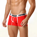 Red metroMalewear cotton short boxer briefs with 7 inch inseam and white elastic waistband with black lettering