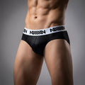 Black men’s briefs metro male wear crocodile hip brief 5003-85 with white elastic waistband and ammun logo in black