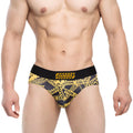 Mens briefs with black and yellow caution tape pattern and danger label on waistband from MetroMaleWear