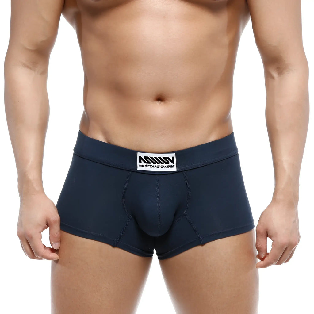 Navy blue metroMalewear deseo boxer briefs with a white label featuring the brand name and logo