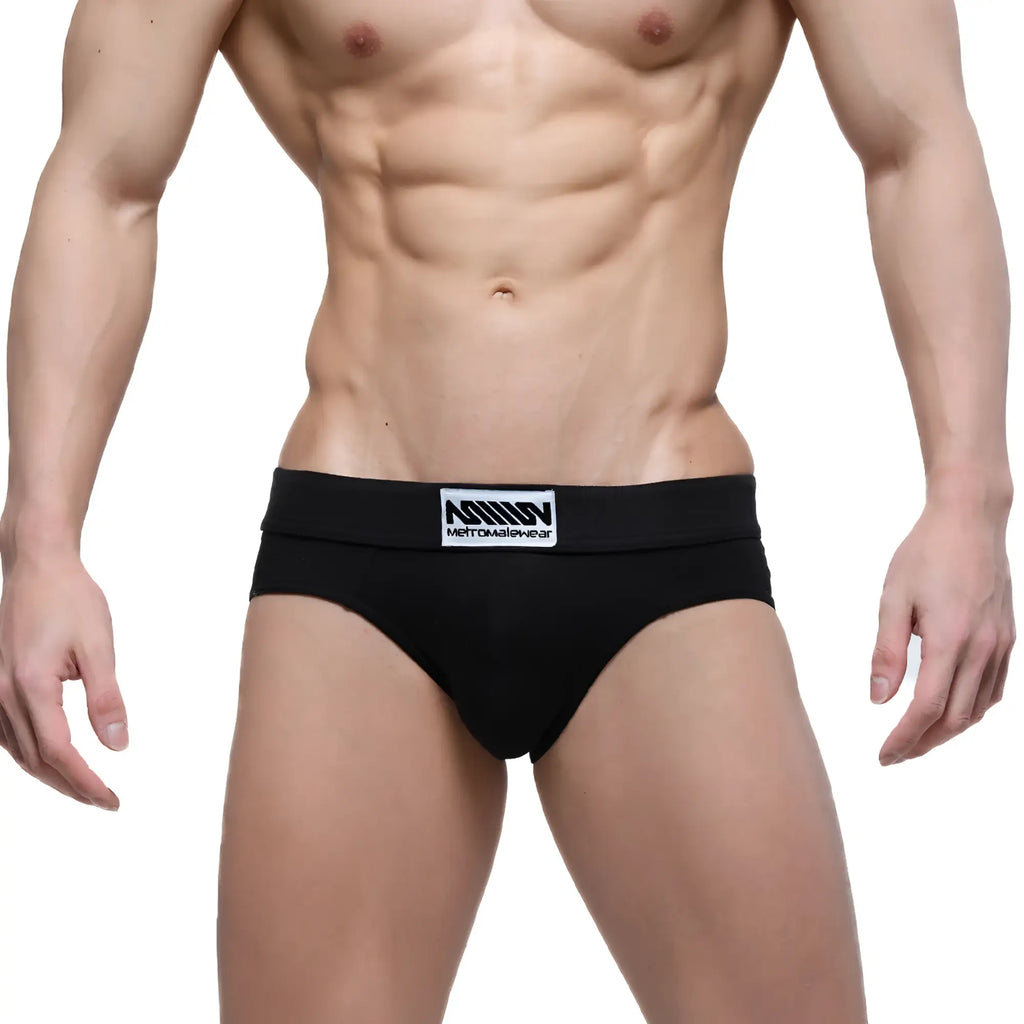 Black mens briefs with a white logo patch on the waistband metroMaleWear deseo brief pearl 5503-22