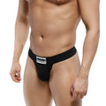 Black men’s briefs by MetroMaleWear Deseo thong black 3312-20 with a white logo patch on the waistband