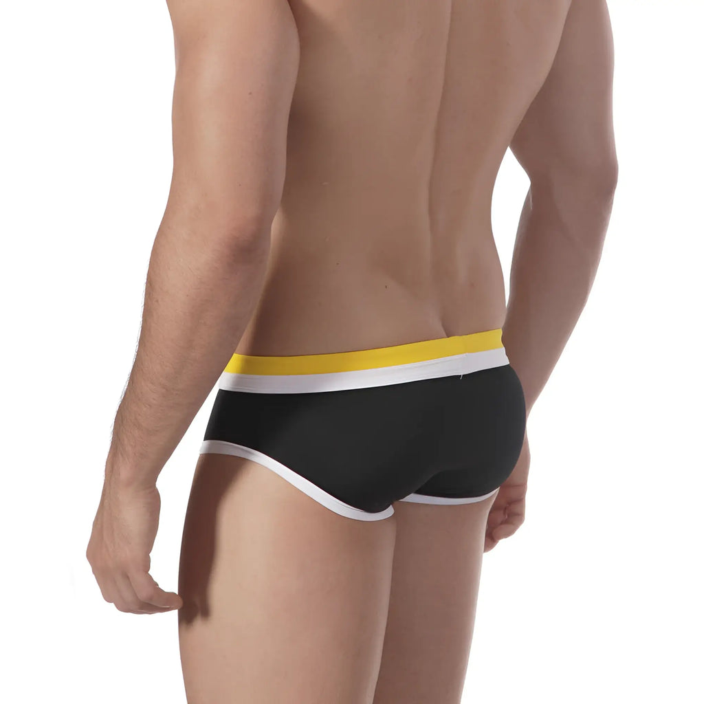 Black metroMalewear double band swim brief with bold yellow and white striped waistband for men