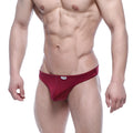 Red form-fitting briefs with subtle sheen and white brand tag on waistband from metromalewear eureka thong purple 1322-29